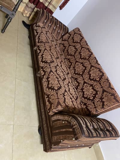 Sofa bed and chairs with table