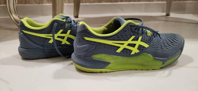Asics Gel Resolution 9 Tennis Shoes.