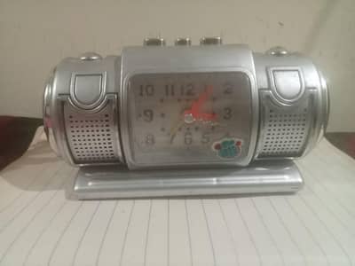 alram watch with two side speaker good condition