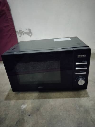 LOGIK MICROWAVE IN GOOD AND NEW CONDITION
