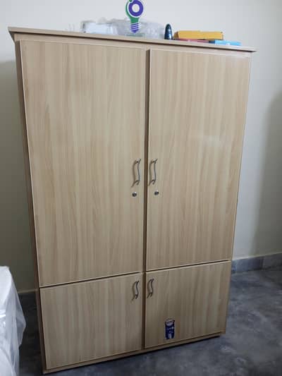 Almost New Wooden Almari with Wheels – Excellent Condition