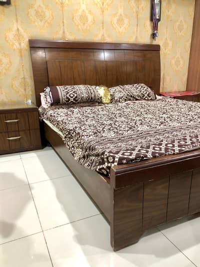 Bed with side tables and mattress