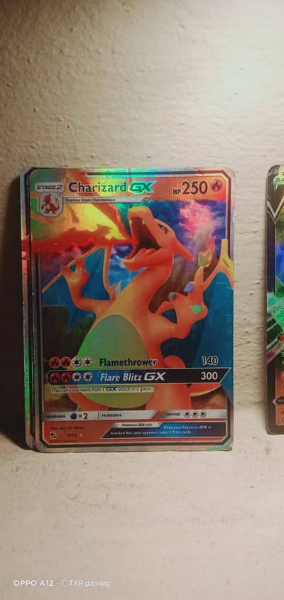 pokemon card (Charizard] selling on olx only 999rupees