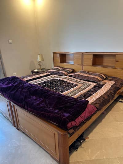 2 Single wooden beds