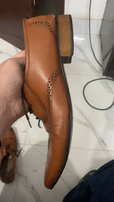 giving away these brown formal laces FREE shoes to first contact man