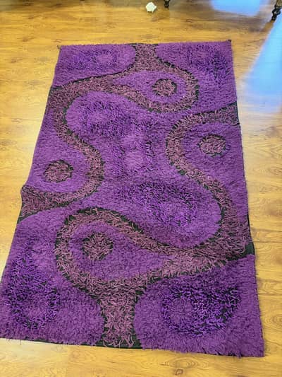 2 rugs purple colour