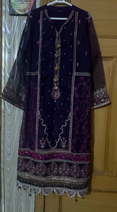 Party wear Brinjal( beingan) colour three pieces suit.