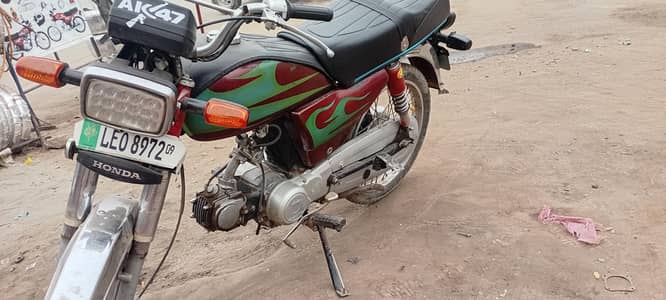 honda cd 70 2009 model for sale nice condition and good average 