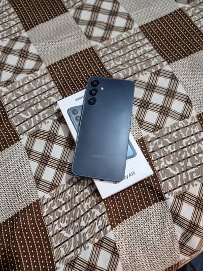 Samsung A16 8 256gb 2 maa ke warranty hy original saman sara hy PTA