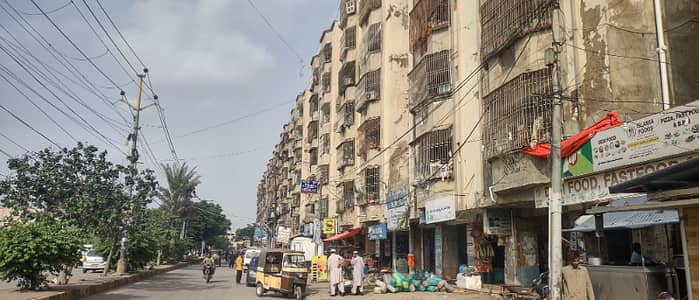 Shop for rent in gulistan e jiuhar bk 13 main road shop for any commercial business