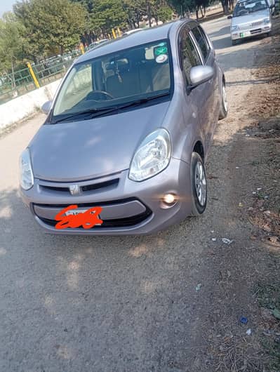 Toyota passo 2014. model. Islamabad number  2018 registered my name