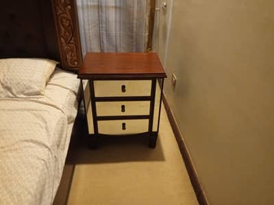 King size bed with side tables and dressing