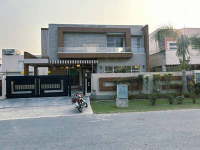 One Kanal Slightly Used Luxury Ultra-Modern Design Most Beautiful Bungalow 2 Servant Quarter In Basement For Sale At Prime Location Of DHA Lahore Near To Park Masjid & Commercial Market.