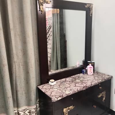 bed and dressing table