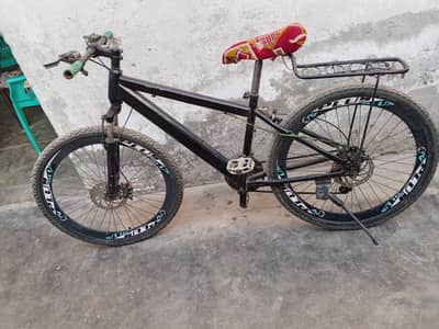 complete black colored bike