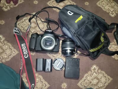 Canon 60d with 18-55mm lens  bag battery charger