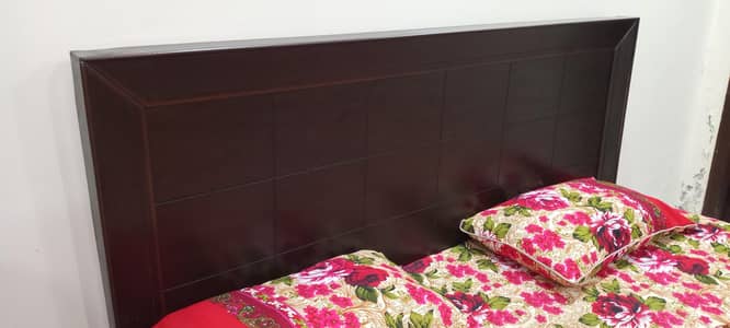 Almost new wooden bed