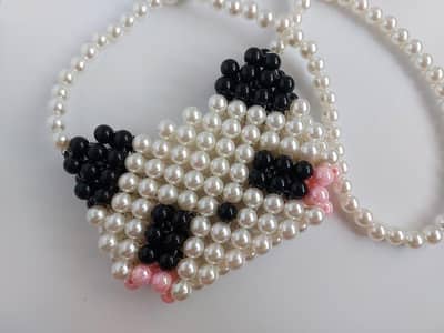 hand made beaded bags and pouches