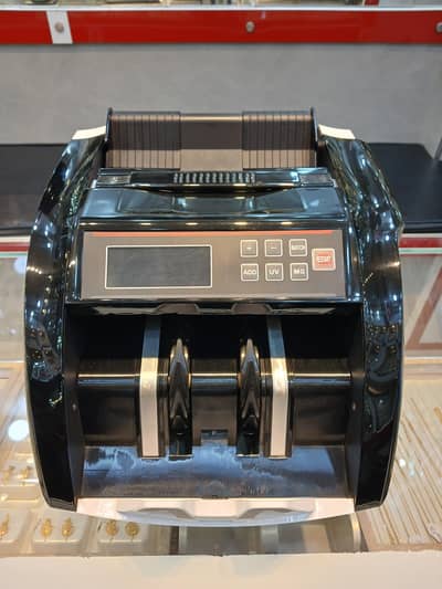 Money counting machine.