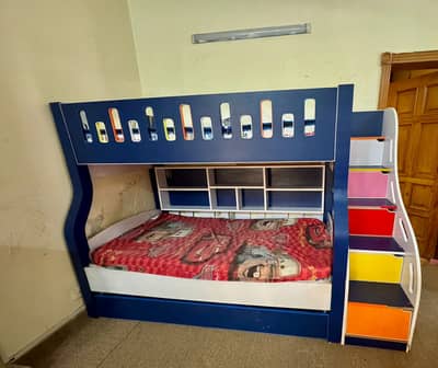 Double bed with lot of space stairs boxes