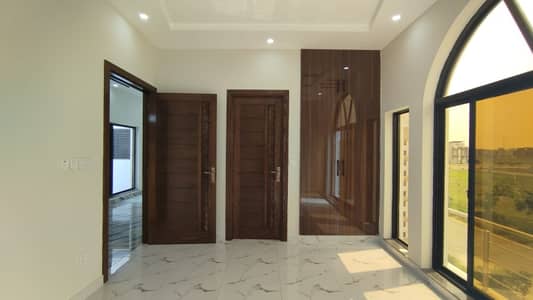 A Masterpiece Of Material & Design Modern 10 Marla Home With Two Company Kitchens & Premium Flooring In DHA Phase 5