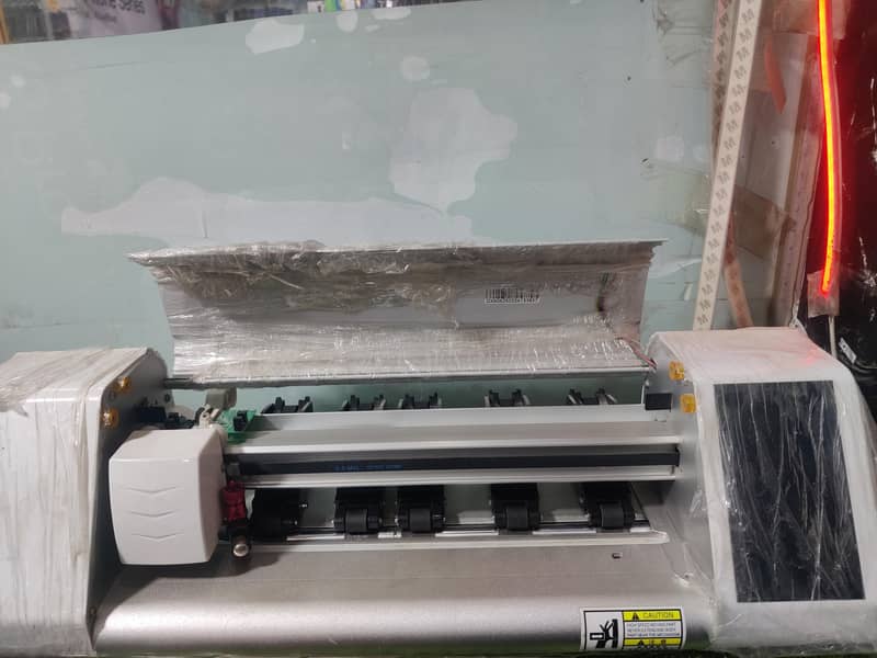 Sheet cutting machine 1