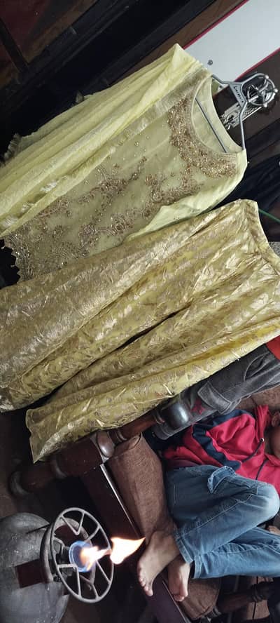 sharara and short frock. . . . . fancy work on it