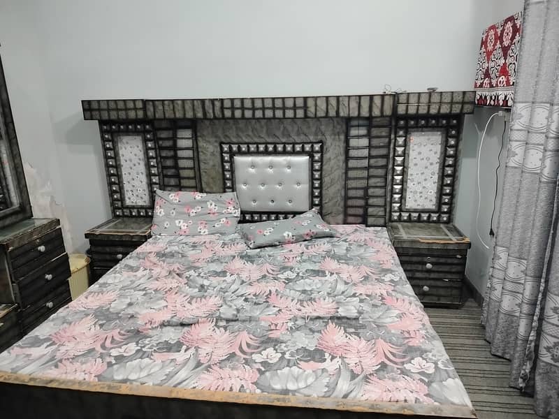 bed and side table 0