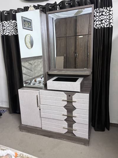 Bed and dressing table