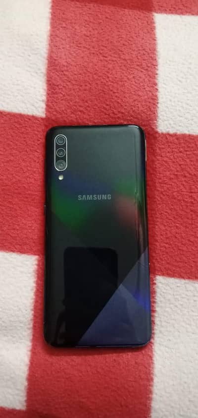 Samsung Galaxy A30S mobile phone for sale +  Black phone cover