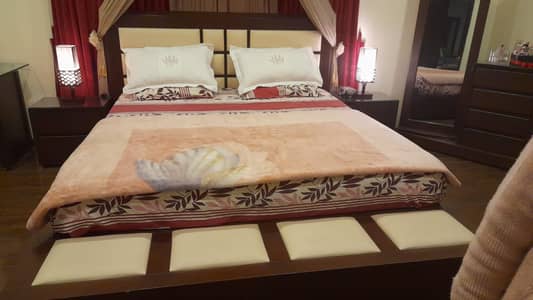 Luxury king-size solid wooden bed set - complete bedroom setup  Styli