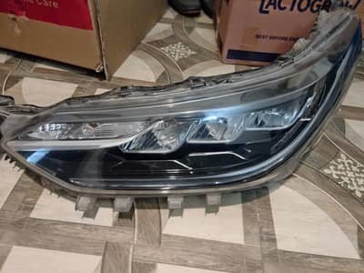 Toyota Yaris 100% original headlights.