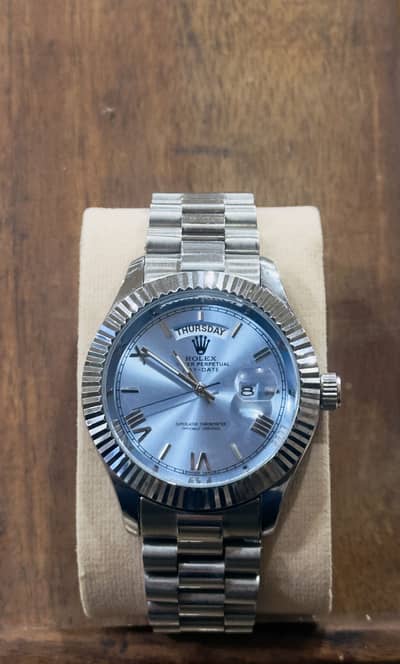 Rolex siera blue date and day stainless steel