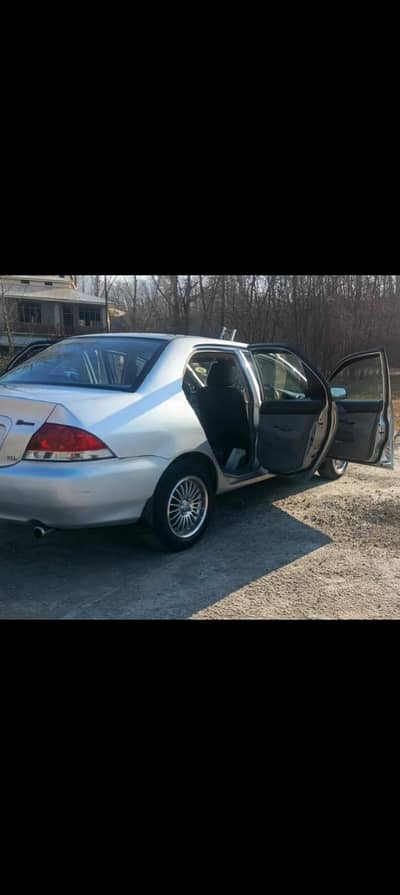 i am selling my car mitsubishi lancer, urgent sale