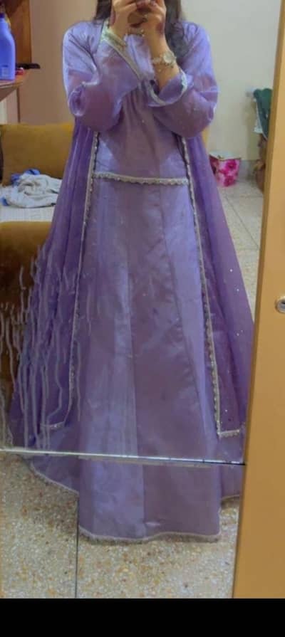 plum colour Shirt and lehenga with net body