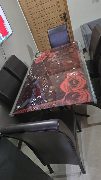 Glass dining table with 6 chairs
