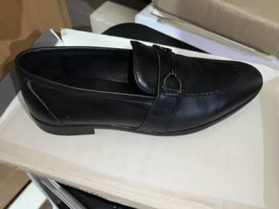 Branded insignia formal loafers