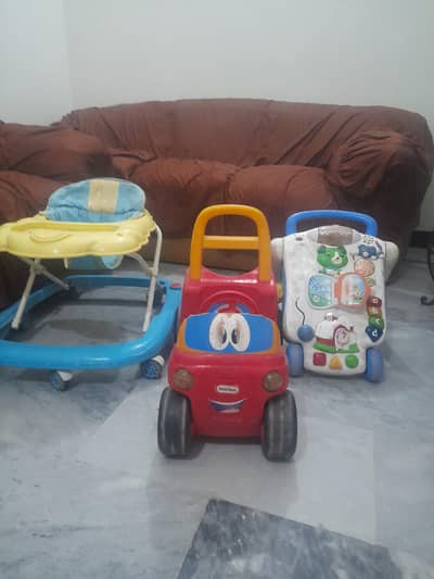 kids car and walker and a walking trally