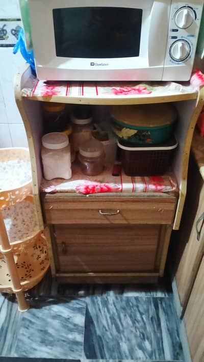 Kitchen oven rack with drawer and storage