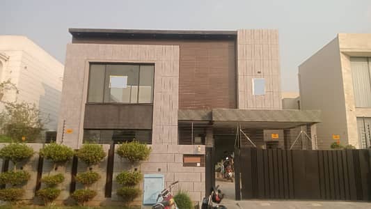 One Kanal Brand New Luxury Ultra-Modern Design Most Beautiful Bungalow 2 Servant Quarter In Basement For Sale At Prime Location Of DHA Lahore Near To Park Masjid & Commercial Market.