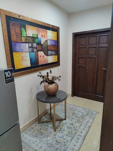 2 Bed Fully Furnished Flat With Original Pictures Attached Available for Rent in the heart of bahria town lahore