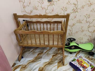 wooden baby cot like new for sale