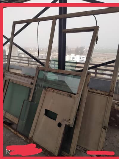 kitchen room disposed with glass fiber and door