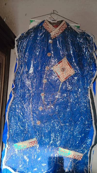 Blue colour Sharwani with suit
