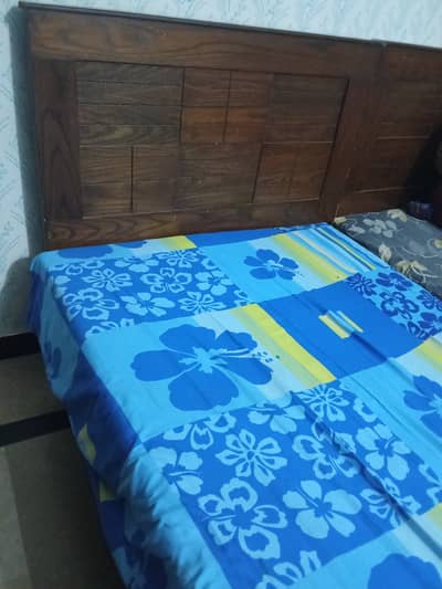 Wooden single bed