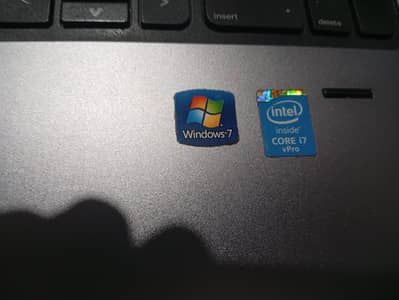 Hpi7 laptop with charger only issue few buttons damage 03257409269