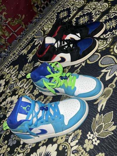 2 pairs of Nike Air Jordan 1 MID SE