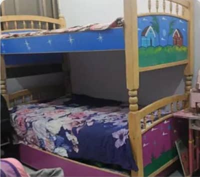 bunk bed for kid with beautiful paintings in reasonable price .