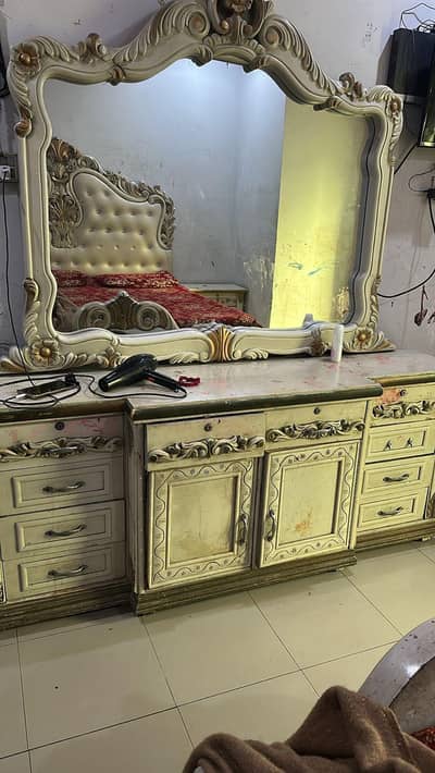 beds with side table and dressing table .