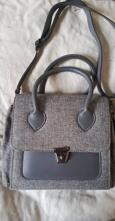 grey hand bage